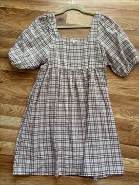 Rylee + Cru "Eleni Dress" in Brown Plaid med 
The perfect fall transition dress!